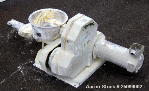 Used K-Tron Volumetric Twin Screw Feeder, Model K2V-T35. Approximate 162.8 pounds per hour output. (2) Approximate 1-3/8" diameter intermeshing 304 stainless steel screws, driven by a 1/2hp, 90 volt,...