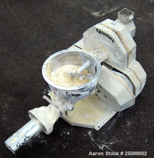 Used K-Tron Volumetric Twin Screw Feeder, Model K2V-T35. Approximate 162.8 pounds per hour output. (2) Approximate 1-3/8" diameter intermeshing 304 stainless steel screws, driven by a 1/2hp, 90 volt,...