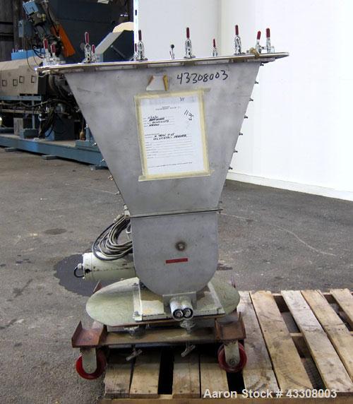 Used K-Tron Volumetric Twin Screw Feeder, Model T35-1-B-2-32-00-A, 304 Stainless Steel. (2) Approximate 1" diameter x 12" long screws, driven by a 1/4 hp motor, approximate 530 pound an hour capacity...