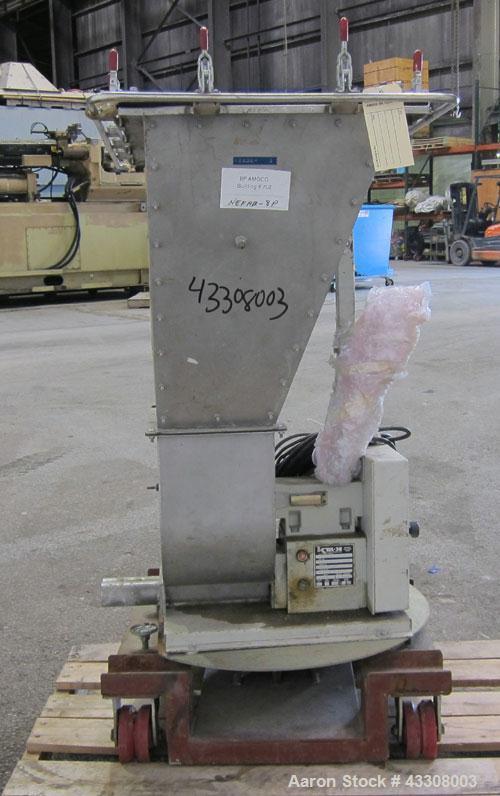 Used K-Tron Volumetric Twin Screw Feeder, Model T35-1-B-2-32-00-A, 304 Stainless Steel. (2) Approximate 1" diameter x 12" long screws, driven by a 1/4 hp motor, approximate 530 pound an hour capacity...