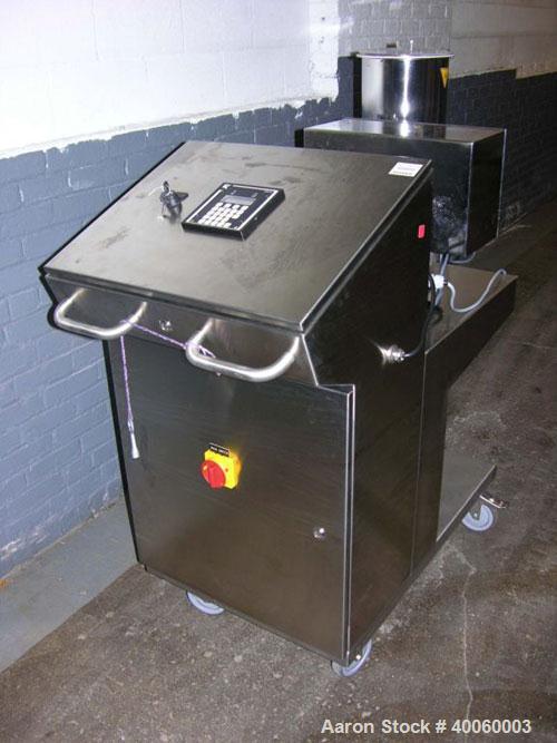 Used: K-Tron gravametric feeder, model K-PH-CC-KT20,stainless steel construction, twin screw design with .17cu.ft. agitated feed hopper, 22 RPM agitator speed, up to154 RPM screw speed, rated .001 - ...
