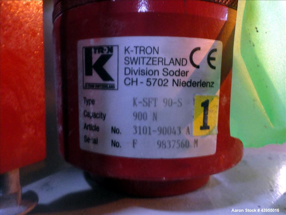 Used K-Tron Volumetric Feeding System consisting of: (1) K-Tron Feeder Model K2MLS60, Stainless Steel. Approximate 2" diameter x 16" long screw driven by a .45kw, 200 volt, 2000 rpm motor. 2000 pound...