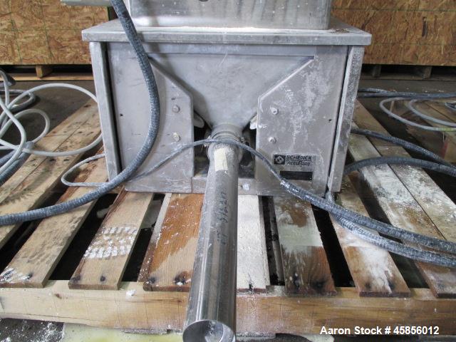 Used Schenk Accurate Volumetric Feeder, Type MOD602M. Stainless steel screw and spout, 2.25" diameter x 21" long spout with screw, driven by approximately 0.25hp DC motor, stainless steel hopper exte...