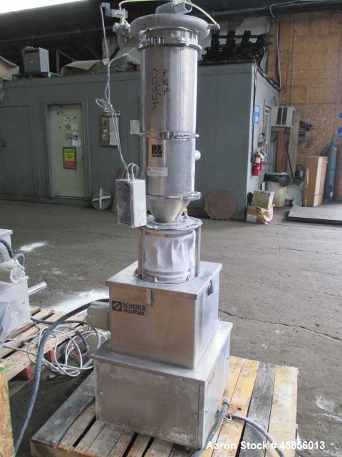 Used Schenk Accurate Volumetric Feeder, Type MOD602M. Stainless steel screw and spout, 2.25" diameter x 21" long spout with screw, driven by approximately 0.25 hp DC motor, stainless steel hopper ext...