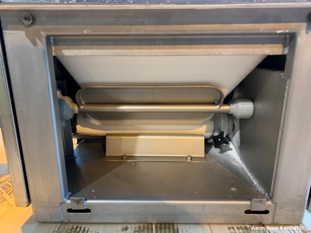 Used Schenck Volumetric Feeder, Model MODMC-IG-1AX. Stainless steel construction. 2" Diameter x 34" long auger. Serial# 65067-01A-MECGM.