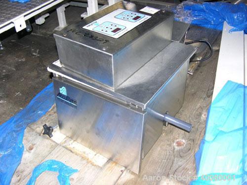 Used: Accurate volumetric feeder, series 300,__" diameter stainless steel auger with __" long plastic spout, dual 1/8 hp DC motors with hopper agitation, rated 369 cu.ft./hr feed rate with spare auge...