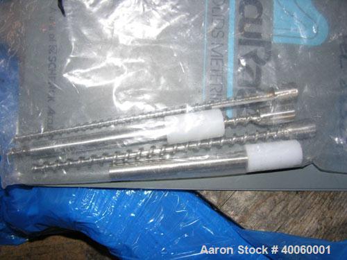 Used: Accurate volumetric feeder, series 300,__" diameter stainless steel auger with __" long plastic spout, dual 1/8 hp DC motors with hopper agitation, rated 369 cu.ft./hr feed rate with spare auge...