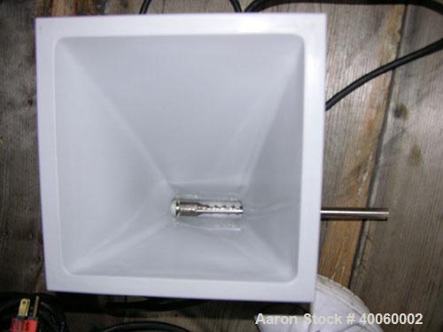 Used: Accurate series 100 volumetric feeder, __"diameter stainless steel auger with __" long spout, with1/60 hp 110 volt motor, rated up to .5 cu.ft./hr feed rate,with spare augers and spouts, serial...