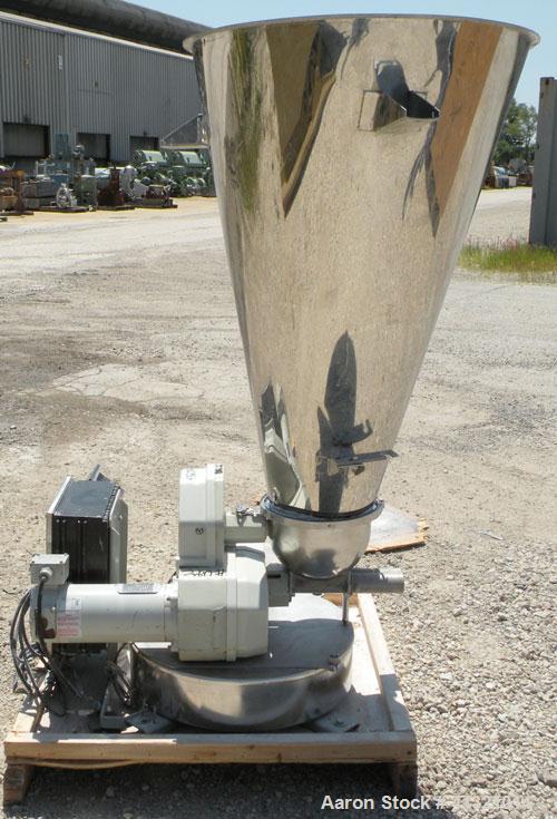Used K-Tron Volumetric Twin Screw Feeder, 304 Stainless Steel. Approximate (.07) cubic feet an hour output.Approximate screw diamter is 1-1/2" total length of twin screws are 9-3/4". Driven by a 1/2 ...