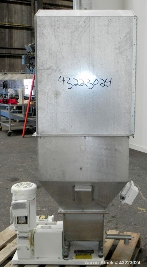 Used Vibra Screw Volumetric 1’’ Versi Feeder, 304 Stainless Steel. Bulk density 47 pounds a cubic foot, flow rate 130-180 pounds an hour. Driven by a 3/4 hp, 3/60/460 volt, 1750 rpm XP gear motor. Un...