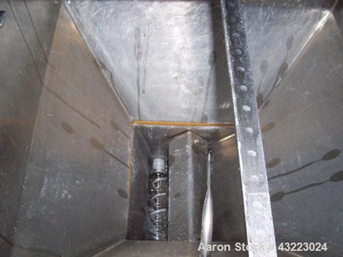 Used Vibra Screw Volumetric 1’’ Versi Feeder, 304 Stainless Steel. Bulk density 47 pounds a cubic foot, flow rate 130-180 pounds an hour. Driven by a 3/4 hp, 3/60/460 volt, 1750 rpm XP gear motor. Un...