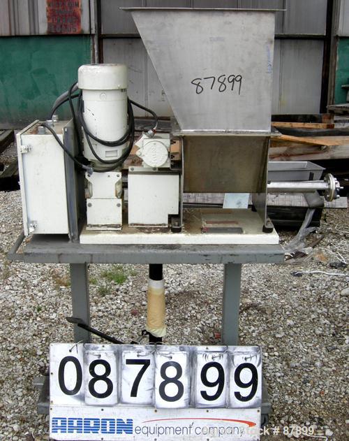 USED: Vibra Screw volumetric feeder, 304 stainless steel. Approximate 1-3/4" diameter x 22" long screw. Approximate 1.5 cubic foot hopper. Driven by a 3/4 hp, 90 volt, 1750 rpm DC gearmotor. Rated ap...