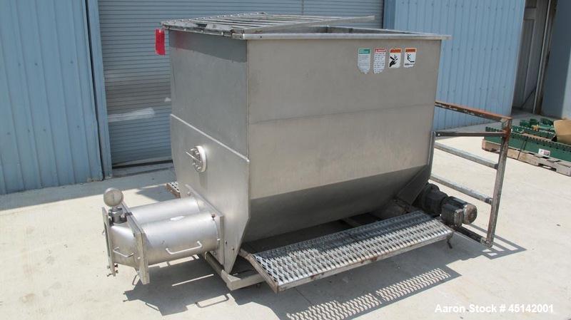 Used Volumetric Twin Screw Feeder.  Stainless steel twin screw feeder with agitator screw.  Screws driven by Eurodrive 3/4 hp each.  Hopper is 45" x 50" long x 48" deep.  Mounted on sub-frame with ca...