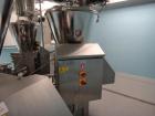 Used Schenk Process Systems Model Mechatron CF GRMD Metered Screw Feeder. Unit includes stainless steel hopper and controls.