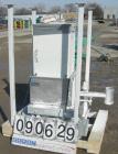 USED: Accurate volumetric dry material feeder. Approximate 2.25