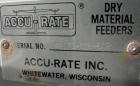 USED: Accurate volumetric dry material feeder. Approximate 2.25