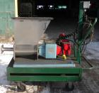 Used Acrison Volumetric Dry Ingredient Feeder, model 105-E, 304 stainless steel. Feed rate to 6 cubic feet per hour. 1-3/8