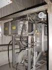 Used Acrison Wildflow Model 203 Feeder. Capacity approximately 2 lb batches. Stainless steel construction. Hard plastic conveyor, 36