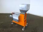 Used Engelhardt Continuous Dosing Weigher, Type KDE-GL 800E. Consists of top feed hopper, vibratory feeder with cover, weighing system, bottom discharge vibratory feeder. Has Engelhardt model DPC3000...