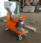Used Engelhardt Continuous Dosing Weigher, Type KDE-GL 800E. Consists of top feed hopper, vibratory feeder with cover, weighing system, bottom discharge vibratory feeder. Has Engelhardt model DPC3000...