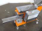 Used Engelhardt Continuous Dosing Weigher, Type KDE-GL 800E. Consists of top feed hopper, vibratory feeder with cover, weighing system, bottom discharge vibratory feeder. Has Engelhardt model DPC3000...
