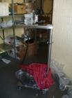Used K-Tron Volumetric Feeder, Model F-1. Stainless steel, dual screw, rated 23 cubic feet an hour. Mounted on a stand with 0.25 hp motor. Serial #930249. Price includes 15% buyer's premium.