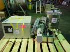 Used Ktron Gravimetric Feeder, Model F-1. Stainless steel construction, twin screw with agitated feed hopper, scale rated 24KG, 11KG net, 13KG tare, .132 HP motor, with controller, serial# 4501074067.