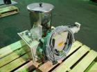 Used Ktron Gravimetric Feeder, Model F-1. Stainless steel construction, twin screw with agitated feed hopper, scale rated 24KG, 11KG net, 13KG tare, .132 HP motor, with controller, serial# 4501074067.