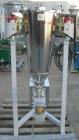 Used K-Tron Vibratory Feeder, Model K2MLKV2, 304 Stainless Steel.  Rated approximately 100 pounds per hour.  Includes a top mounted 316 stainless steel hopper and a Smart Control Module with keypad.