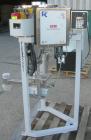 Used K-Tron Vibratory Feeder, Model K2MLKV2, 304 Stainless Steel.  Rated approximately 100 pounds per hour.  Includes a top mounted 316 stainless steel hopper and a Smart Control Module with keypad.