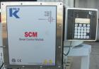 Used K-Tron Vibratory Feeder, Model K2MLKV2, 304 Stainless Steel.  Rated approximately 100 pounds per hour.  Includes a top mounted 316 stainless steel hopper and a Smart Control Module with keypad.