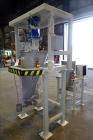 Used Feeder System Consisting of  (1) K-Tron feeder model K2MLS rated for 300 pounds per hour driven by a 0.45 kw, 200 volt, 2000 rpm motor (1) K-Tron feeder model K2MLT20 rated for 20 pounds per hou...