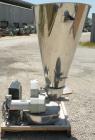 Used K-Tron Volumetric Twin Screw Feeder, 304 Stainless Steel. Approximate (.07) cubic feet an hour output.Approximate screw diamter is 1-1/2