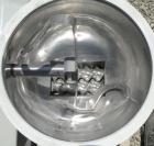 Used K-Tron Volumetric Twin Screw Feeder, 304 Stainless Steel. Approximate (.07) cubic feet an hour output.Approximate screw diamter is 1-1/2