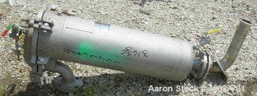 Used Filtration Systems Basket Strainer Filter, 316 stainless steel. Chamber approximately 8" diameter x 29" deep. Flat bolt down top cover, rated 150 at 450 deg.f.. 2" inlet/outlet. Removable basket...