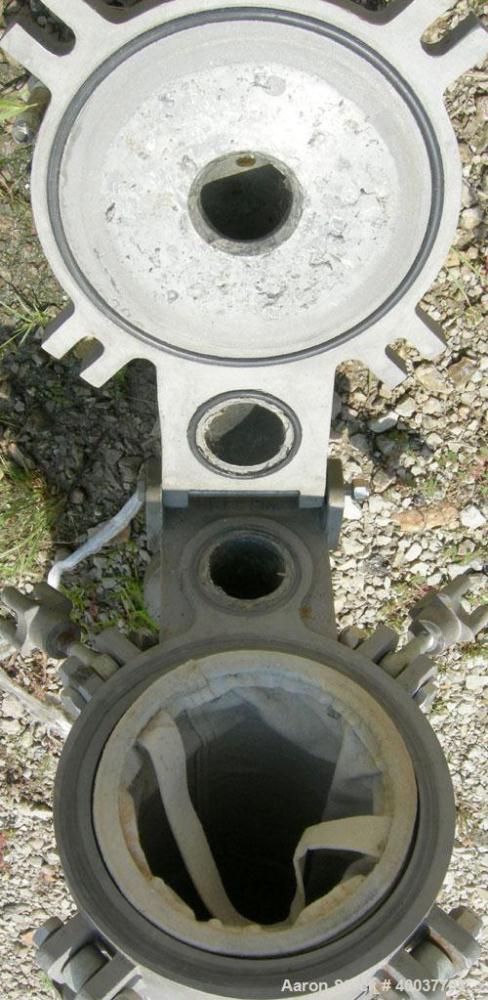 Used Filtration Systems Basket Strainer Filter, 316 stainless steel. Chamber approximately 8" diameter x 29" deep. Flat bolt down top cover, rated 150 at 450 deg.f.. 2" inlet/outlet. Removable basket...