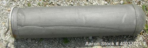 Used Filtration Systems Basket Strainer Filter, 316 stainless steel. Chamber approximately 8" diameter x 29" deep. Flat bolt down top cover, rated 150 at 450 deg.f.. 2" inlet/outlet. Removable basket...