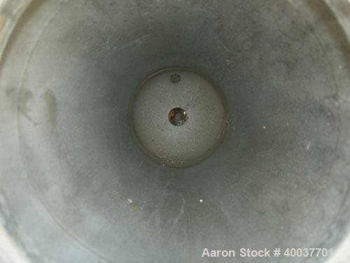 Used Filtration Systems Basket Strainer Filter, 316 stainless steel. Chamber approximately 8" diameter x 29" deep. Flat bolt down top cover, rated 150 at 450 deg.f.. 2" inlet/outlet. Removable basket...