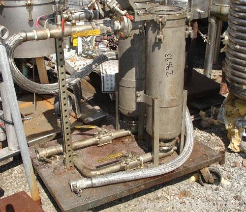 Used American Filter Dual Basket Filter, stainless steel construction, dual 7" diameter x 24" deep baskets, rated 150 PSI at 450 degrees F, on cart, Serial No. 386-9.