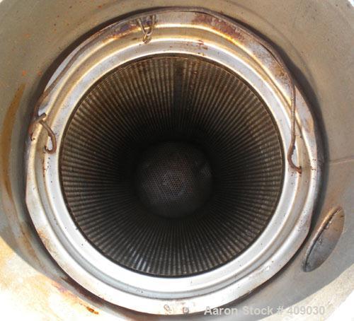 Used Basket Strainer Filter, 304 Stainless Steel. Chamber approximately 8 1/4" diameter x 33 1/2" deep. Flat bolt down top cover. 2" sanitary inlet/outlet. Removable basket 6 1/2" diameter x 27" deep...