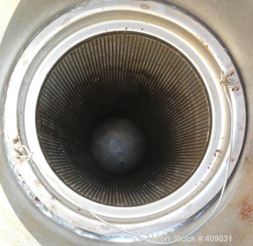 Used Basket Strainer Filter, 304 Stainless Steel. Chamber approximately 8 1/4" diameter x 33 1/2" deep. Flat bolt down top cover. 2" sanitary inlet/outlet. Removable basket 6 1/2" diameter x 27" deep...