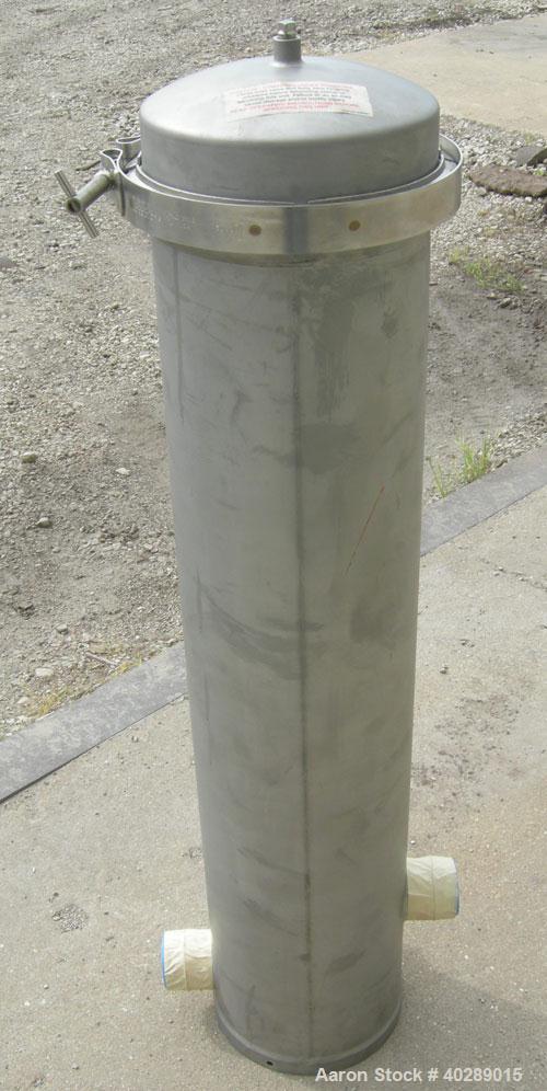 Unused-Cuno cartridge type filter, model 5DC3, 304 stainless steel. Approximate 1 square foot filter area. 8" diameter x 31" deep. Vertical housing rated 150 psi at 250 deg F. Clamp top cover, approx...