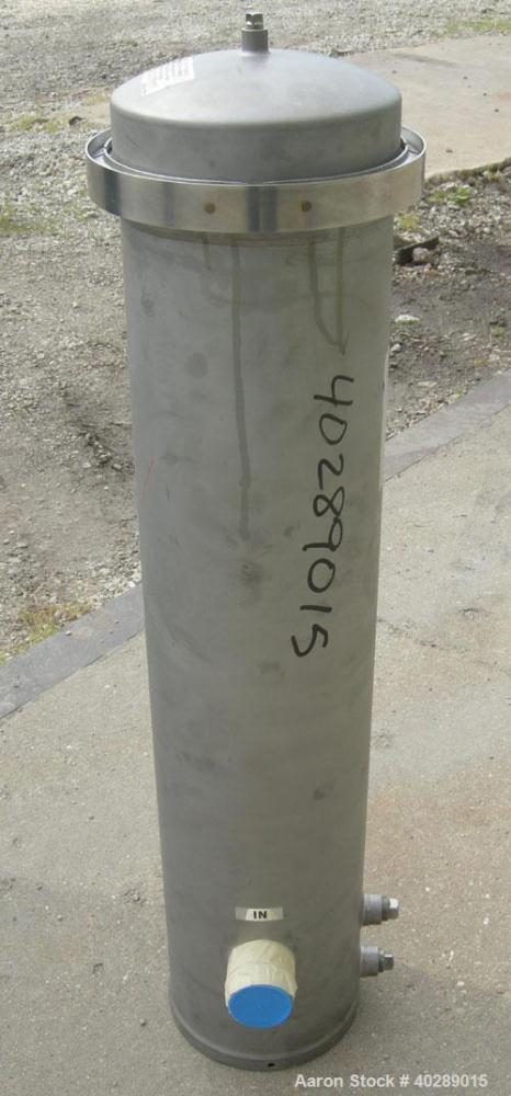 Unused-Cuno cartridge type filter, model 5DC3, 304 stainless steel. Approximate 1 square foot filter area. 8" diameter x 31" deep. Vertical housing rated 150 psi at 250 deg F. Clamp top cover, approx...