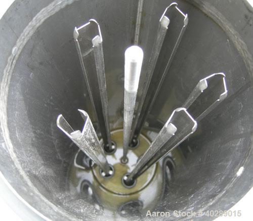 Unused-Cuno cartridge type filter, model 5DC3, 304 stainless steel. Approximate 1 square foot filter area. 8" diameter x 31" deep. Vertical housing rated 150 psi at 250 deg F. Clamp top cover, approx...