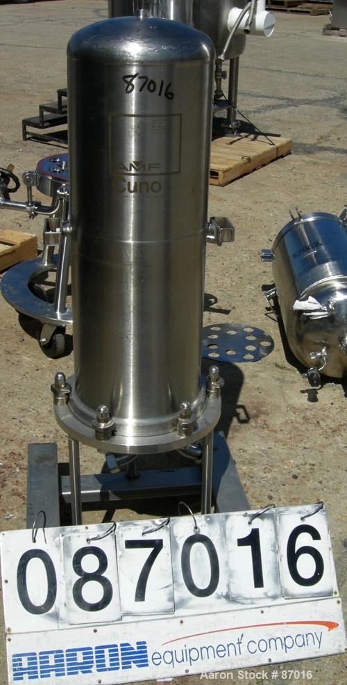 USED: AMF Cuno Zeta Plus cartridge filter, model 12ZP3, 316 stainless steel. 12" diameter x 36" long. Dish top, flat bolt-on bottom. Internal rated 125 psi at 200 deg F. 2" inlet/outlet. Mounted on a...
