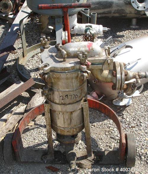 Used American Basket Filter, stainless steel construction, 7" diameter x 10" deep baskets, rated 150 psi at 200 degrees F, serial #3076.