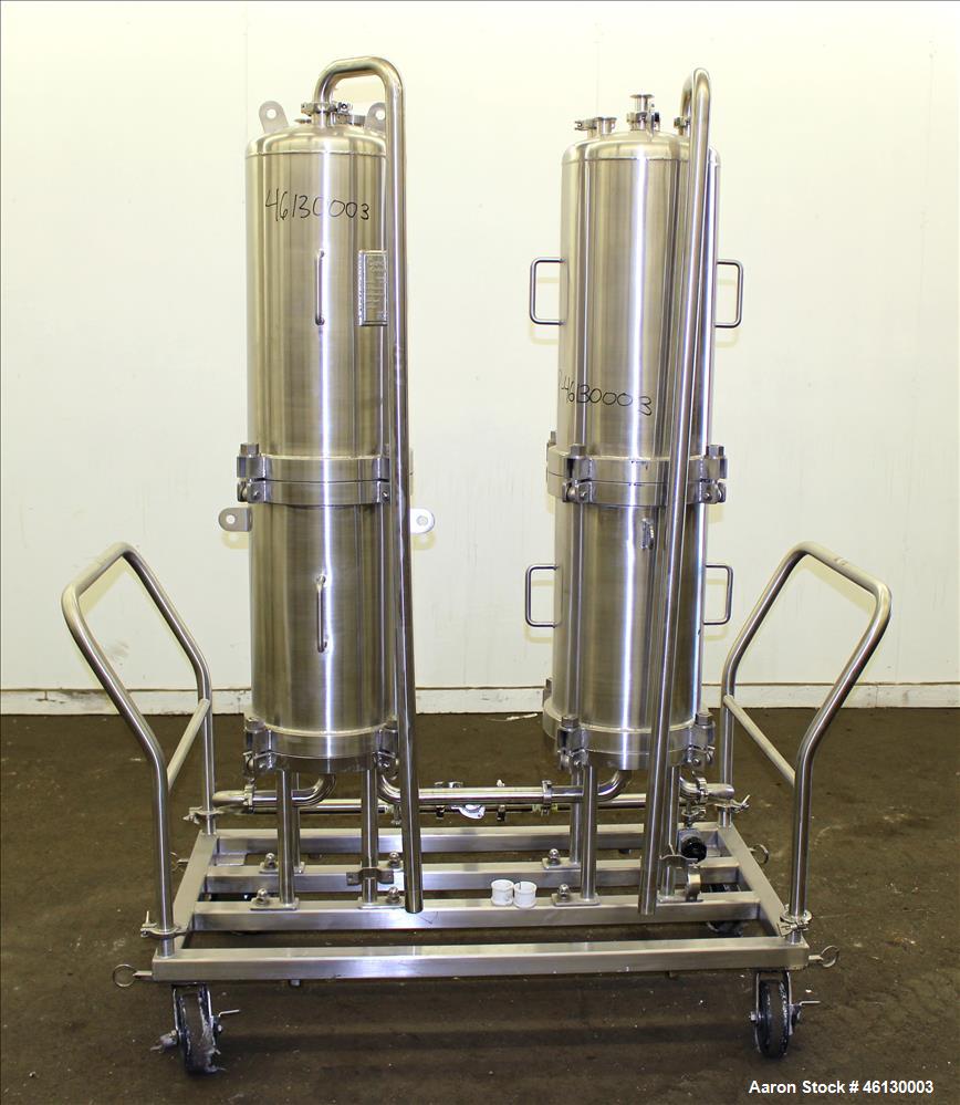 Used Cuno Dual Filter Skid, Model 12ZPB4, 316L Stainless Steel. (2) Cartridge filter housings, no filters, approximately 12-1/2" diameter x 47" straight side. Internal rated 75 psi/full vacuum at -20...