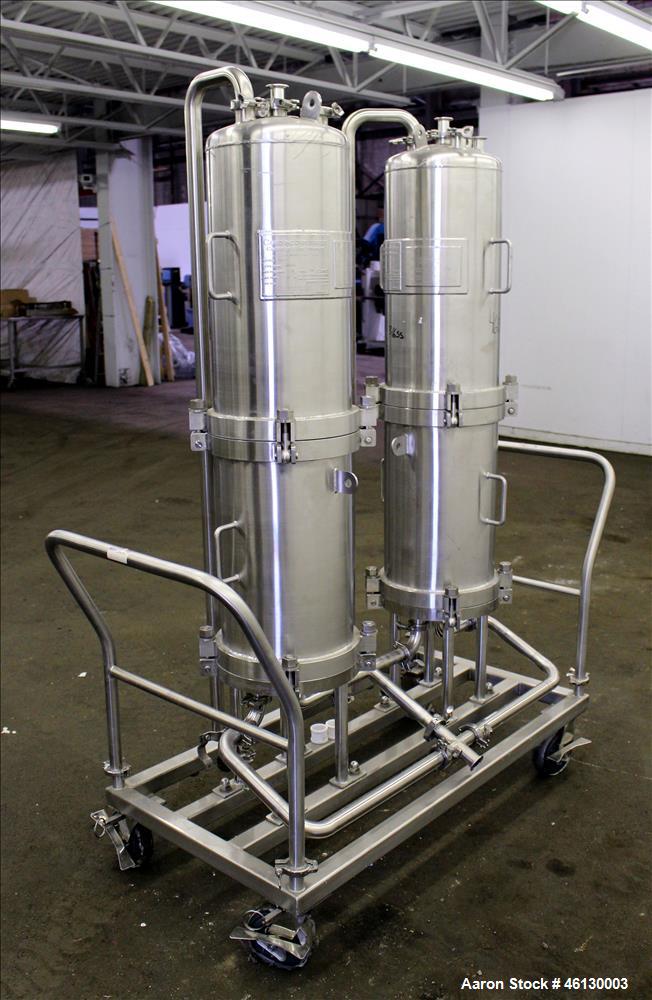 Used Cuno Dual Filter Skid, Model 12ZPB4, 316L Stainless Steel. (2) Cartridge filter housings, no filters, approximately 12-1/2" diameter x 47" straight side. Internal rated 75 psi/full vacuum at -20...