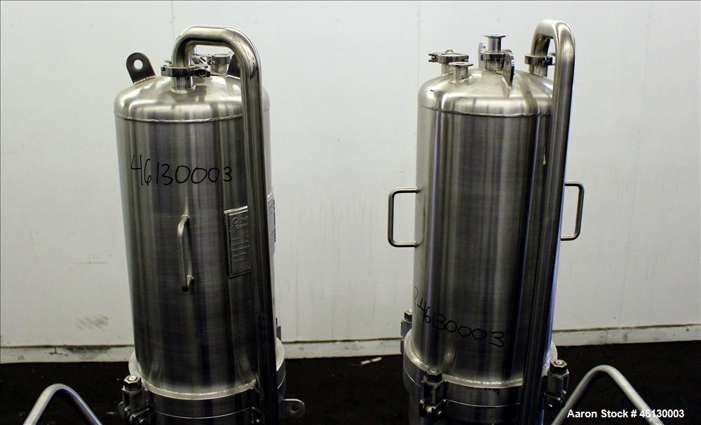 Used Cuno Dual Filter Skid, Model 12ZPB4, 316L Stainless Steel. (2) Cartridge filter housings, no filters, approximately 12-1/2" diameter x 47" straight side. Internal rated 75 psi/full vacuum at -20...