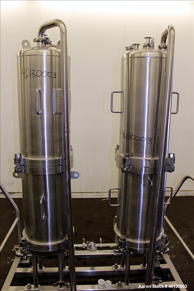 Used Cuno Dual Filter Skid, Model 12ZPB4, 316L Stainless Steel. (2) Cartridge filter housings, no filters, approximately 12-1/2" diameter x 47" straight side. Internal rated 75 psi/full vacuum at -20...